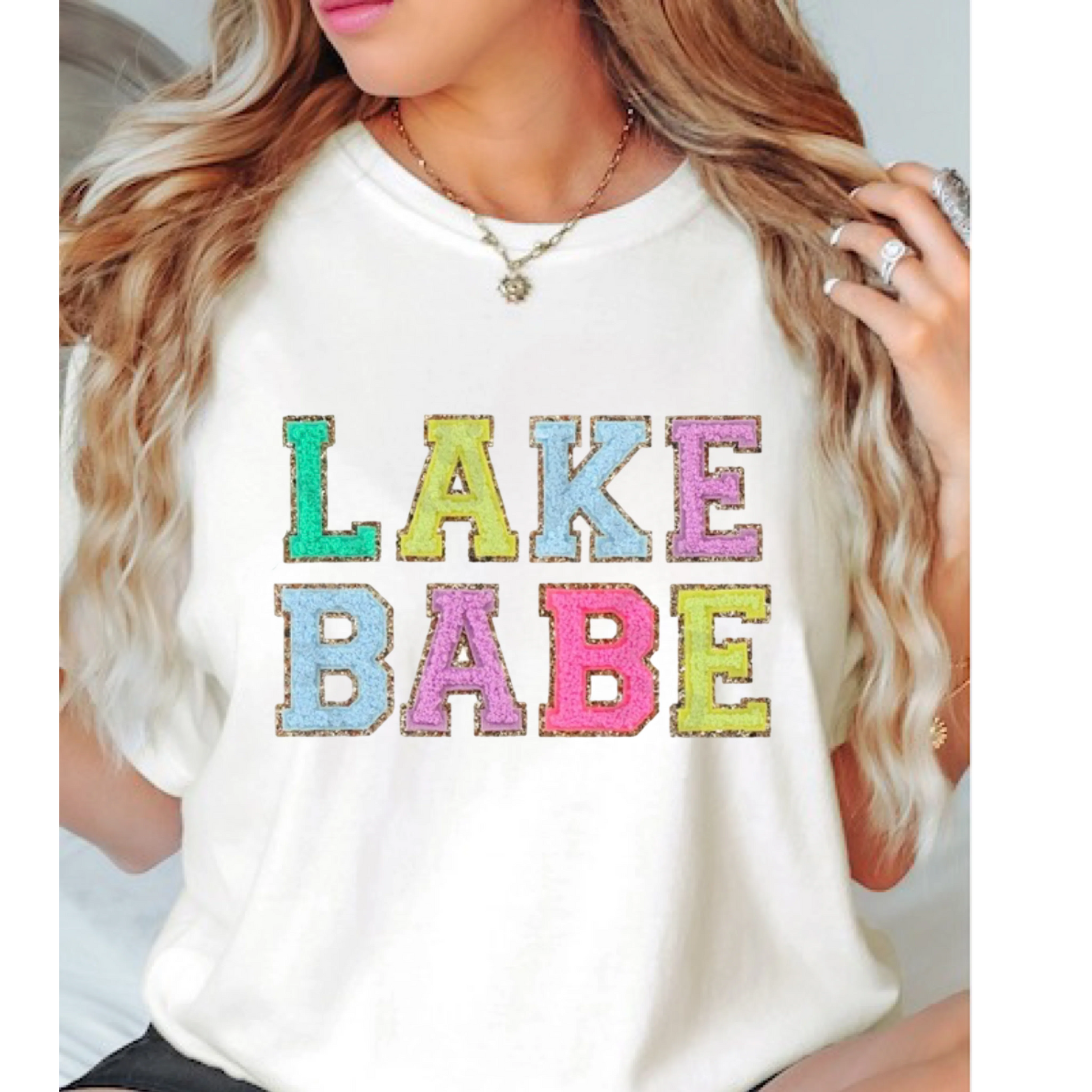 Go fancy with the ‘Lake Babe’ Graphic Tee!  This tee is great to add a playful touch into your wardrobe due to the bright DTF print.